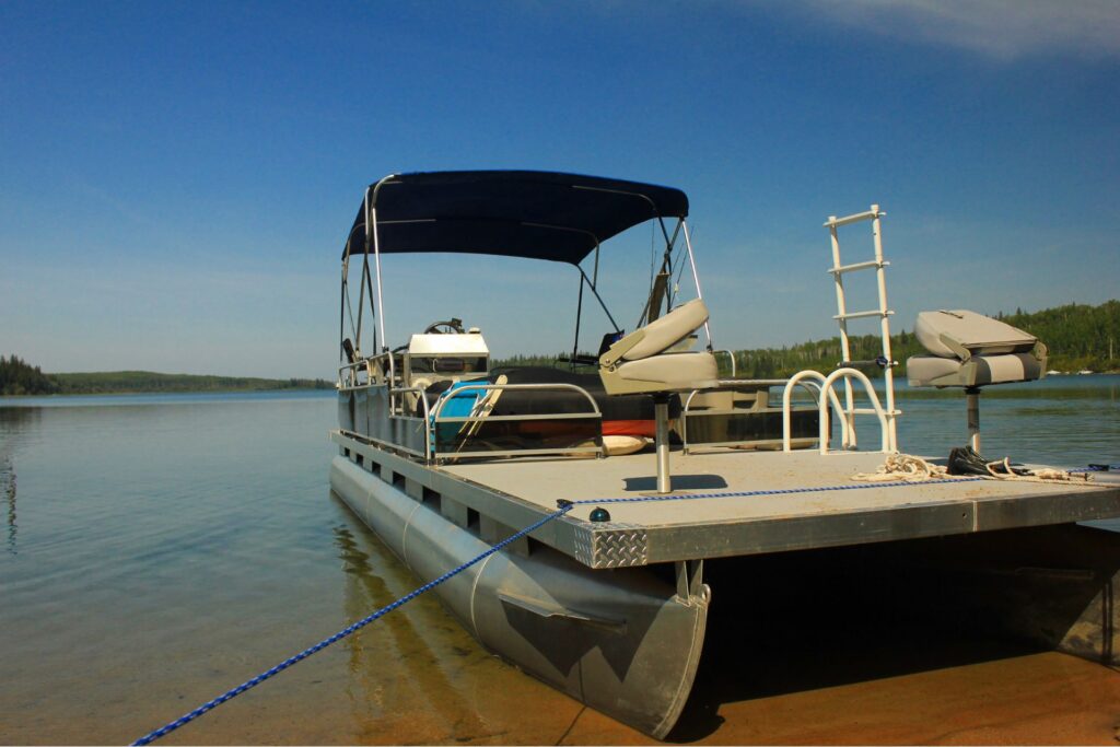 A pontoon boat in a lake